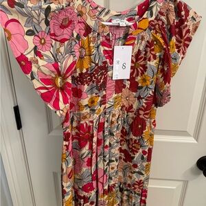 Umgee dress. New with tags. Size small.
